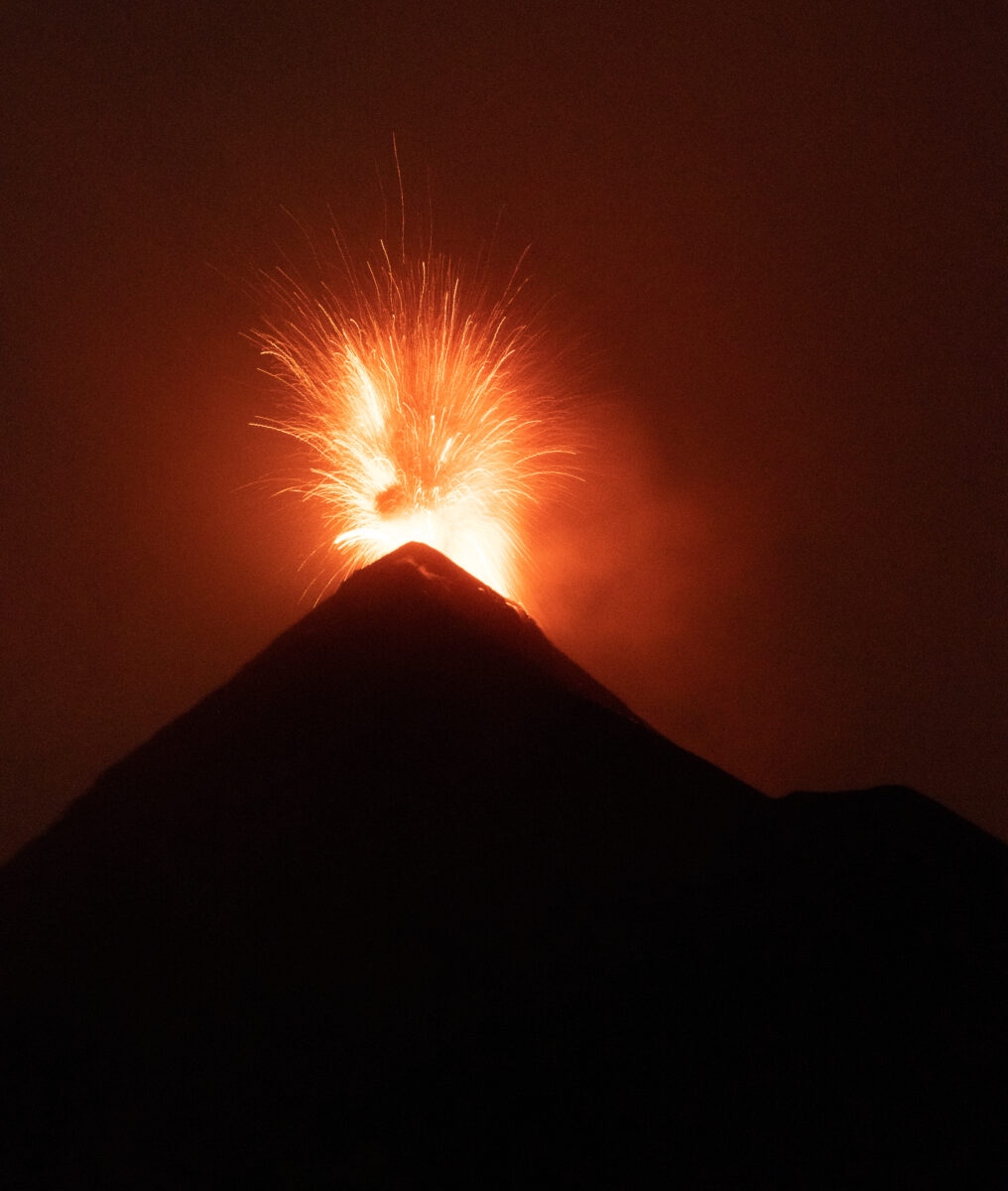 Volcan de Fuego erupting at night