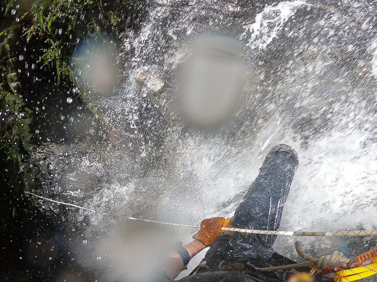 Rappeling down a waterfall while canyoning in Costa Rica